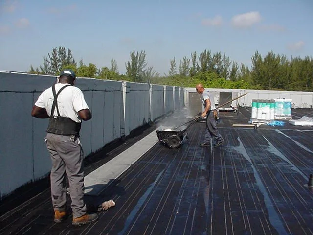 BTB Construction roofing crew pictured working on a flat roof