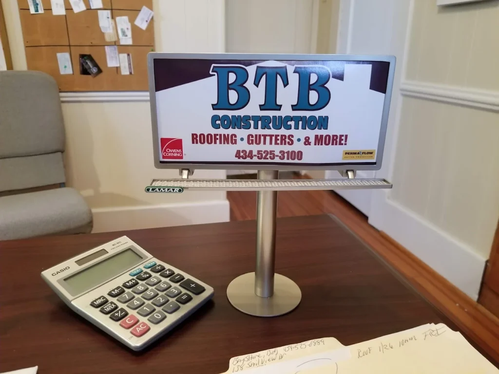 BTB Construction office sign showing they are knee deep in roofing projects this winter