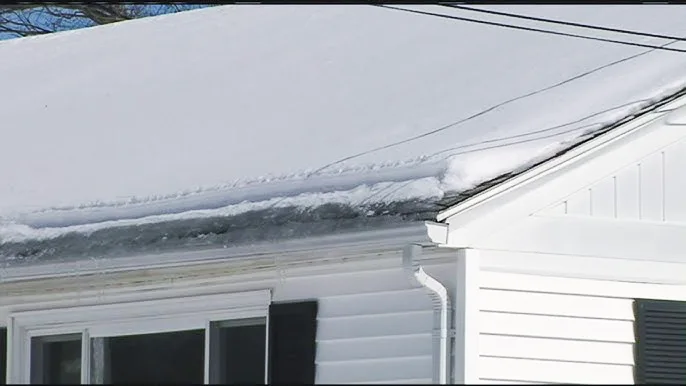 snow sitting on a roof in lynchburg va